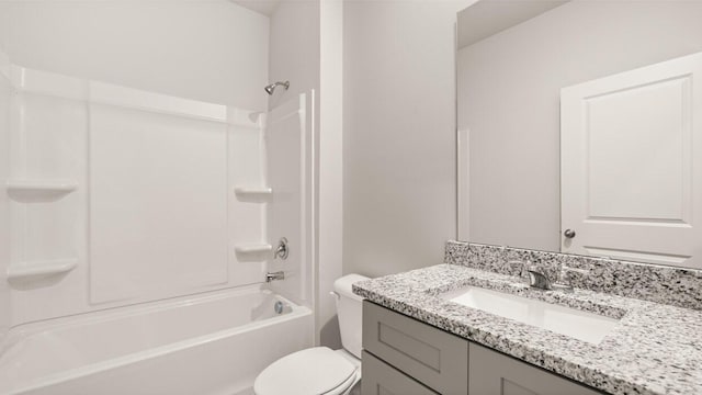 full bathroom featuring toilet, vanity, and shower / bathtub combination