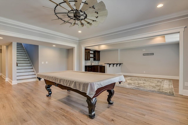 playroom featuring sink, light hardwood / wood-style floors, ornamental molding, and billiards