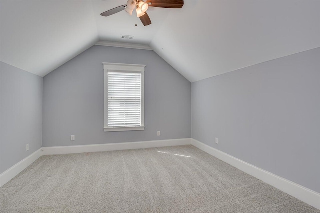 bonus room featuring ceiling fan, carpet floors, and vaulted ceiling