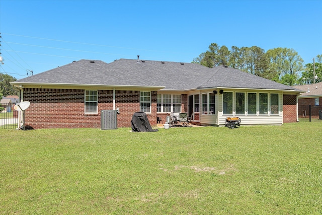 2795 Davis Mill Rd, Hephzibah, GA 30815 - rear view of property with a lawn, fence, cooling unit, and brick siding