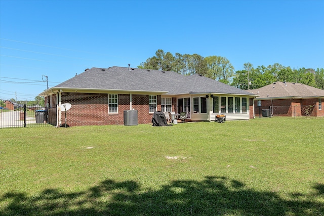 2795 Davis Mill Rd, Hephzibah, GA 30815 - back of property featuring cooling unit, a yard, brick siding, and fence