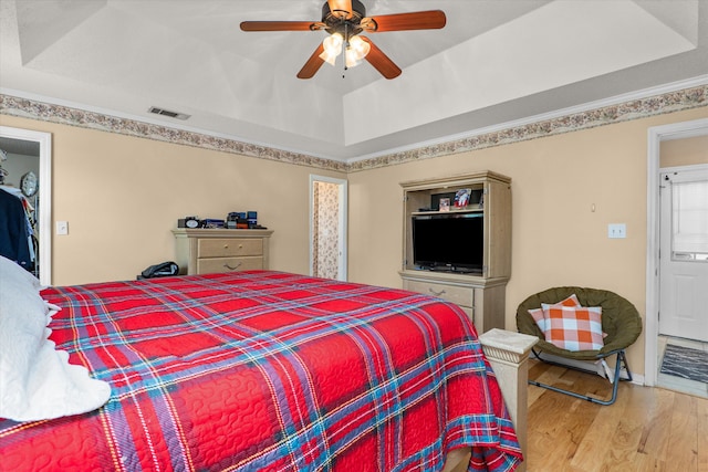 2795 Davis Mill Rd, Hephzibah, GA 30815 - bedroom with a raised ceiling, wood finished floors, visible vents, and ceiling fan