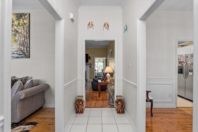 2795 Davis Mill Rd, Hephzibah, GA 30815 - corridor with light wood finished floors and ornamental molding