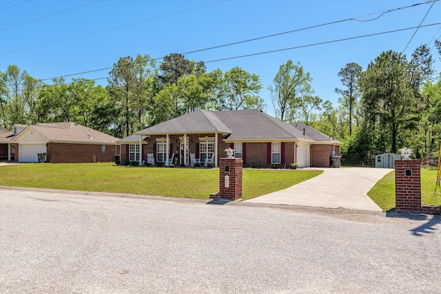 2795 Davis Mill Rd, Hephzibah, GA 30815 - single story home featuring brick siding, an attached garage, driveway, and a front yard