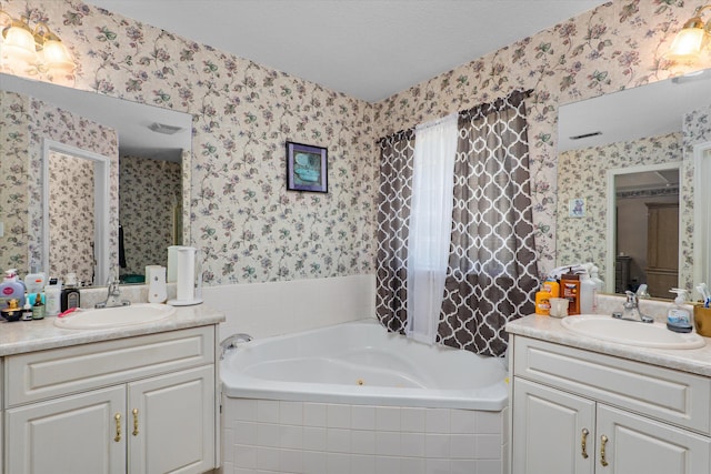 2795 Davis Mill Rd, Hephzibah, GA 30815 - bathroom with wallpapered walls, two vanities, a tub with jets, and a sink
