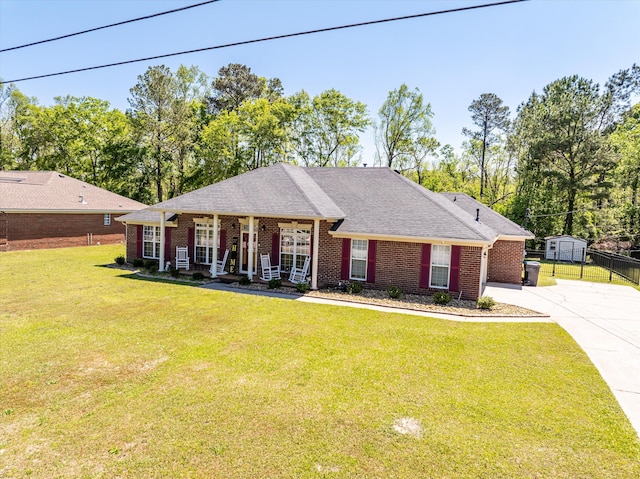 2795 Davis Mill Rd, Hephzibah, GA 30815 - ranch-style home featuring brick siding, concrete driveway, a front lawn, and fence