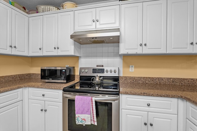 2795 Davis Mill Rd, Hephzibah, GA 30815 - kitchen featuring decorative backsplash, white cabinetry, appliances with stainless steel finishes, and under cabinet range hood