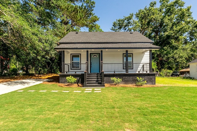 5 Elm St, Beech Island, SC 29841 - bungalow featuring a shingled roof, covered porch, and a front yard