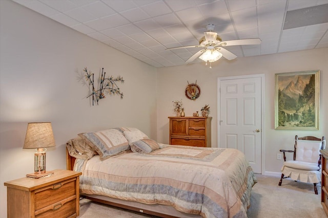 bedroom with ceiling fan and light carpet