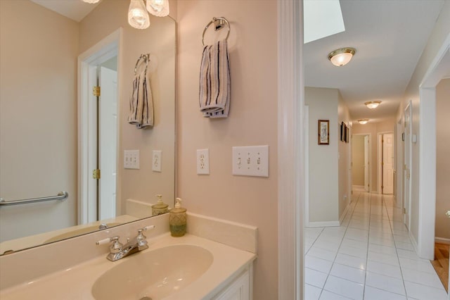 bathroom with vanity and tile patterned floors