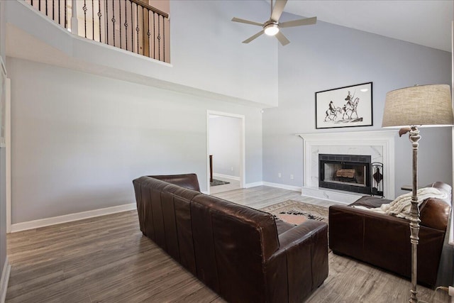 703 Low Meadow Dr, Evans, GA 30809 - living area featuring high vaulted ceiling, a ceiling fan, wood finished floors, and a premium fireplace