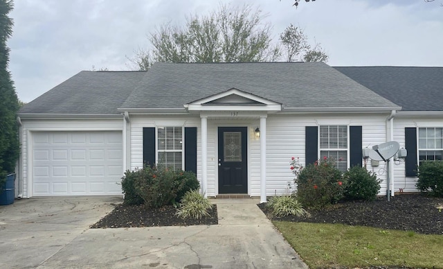 view of front of home featuring a garage