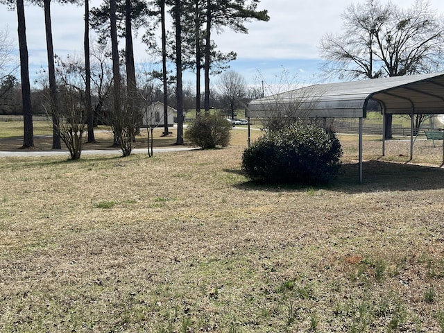 view of yard featuring a carport