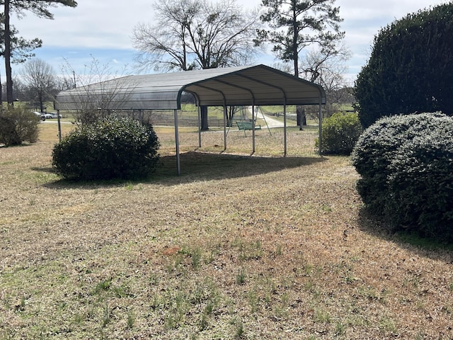 view of yard featuring a carport