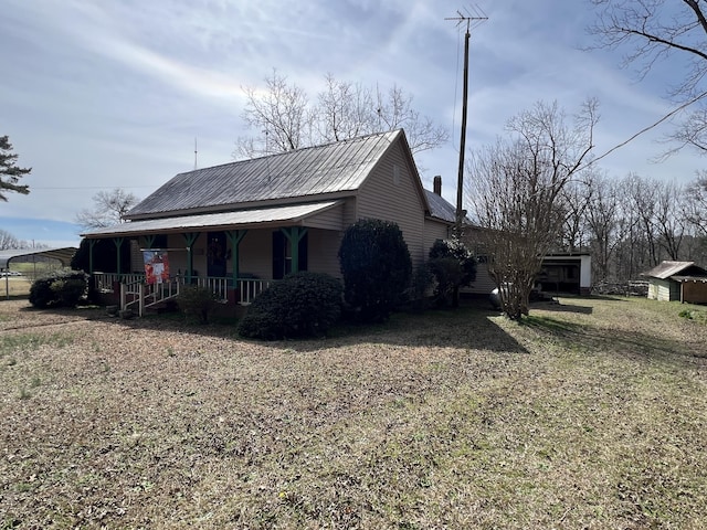 view of home's exterior featuring a porch