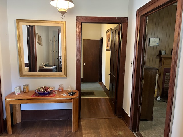 corridor featuring dark wood-type flooring