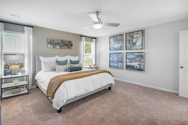 bedroom featuring ceiling fan and carpet floors