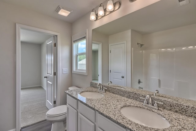 full bathroom featuring toilet, vanity, shower / bathtub combination, and hardwood / wood-style flooring