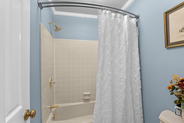 bathroom with crown molding and shower / bath combo with shower curtain