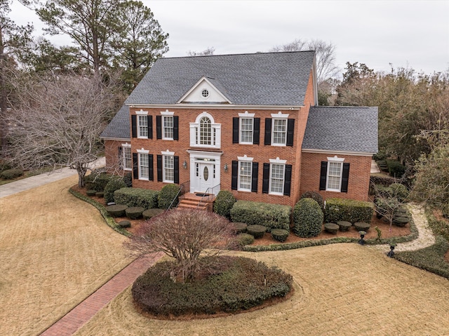 colonial house with a front yard