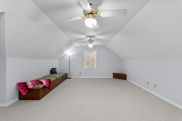 bonus room with lofted ceiling, ceiling fan, and carpet flooring