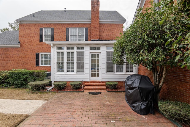 back of house featuring a patio area