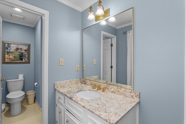 bathroom with vanity, ornamental molding, and toilet