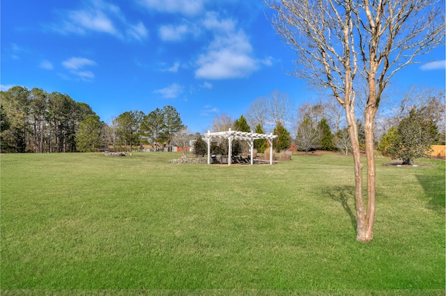 view of yard with a pergola