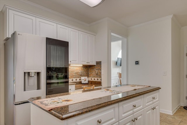 kitchen with baseboards, white cabinets, ornamental molding, decorative backsplash, and stainless steel fridge with ice dispenser