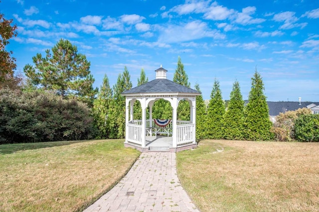 view of community featuring a gazebo and a yard