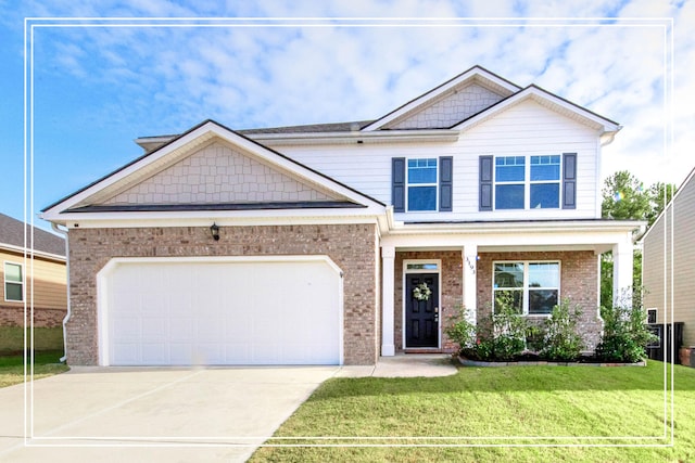 craftsman-style home featuring a front lawn and a garage