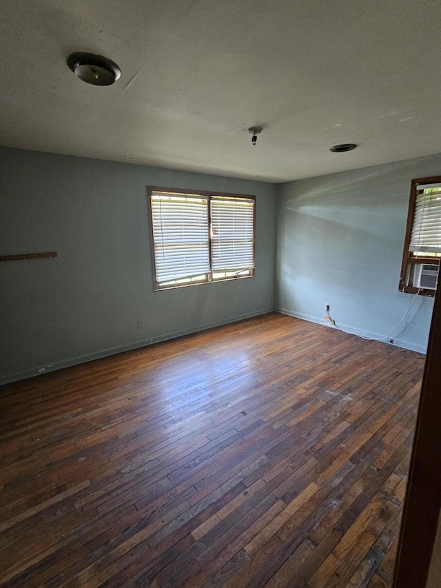 109 E E Walker St, Augusta, GA 30901 - unfurnished room with plenty of natural light and dark wood-type flooring