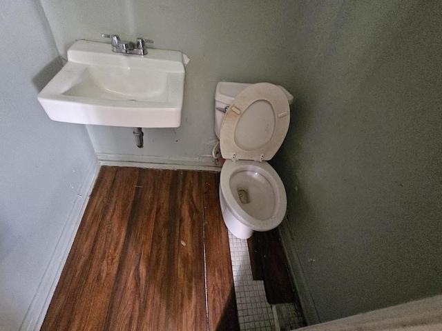 109 E E Walker St, Augusta, GA 30901 - bathroom featuring a sink and wood finished floors