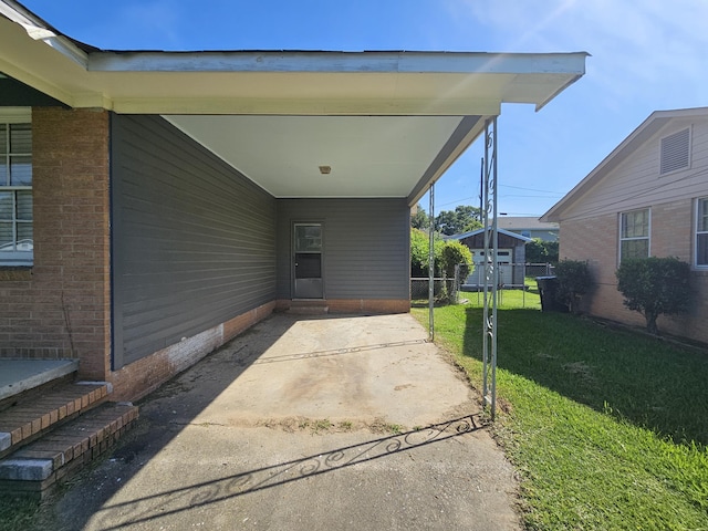 109 E E Walker St, Augusta, GA 30901 - view of patio / terrace featuring an attached carport