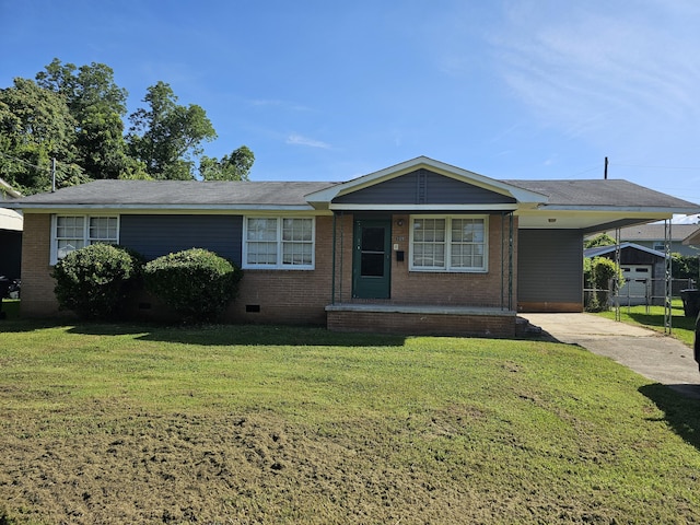 109 E E Walker St, Augusta, GA 30901 - view of front of home with a front yard, an attached carport, crawl space, and brick siding
