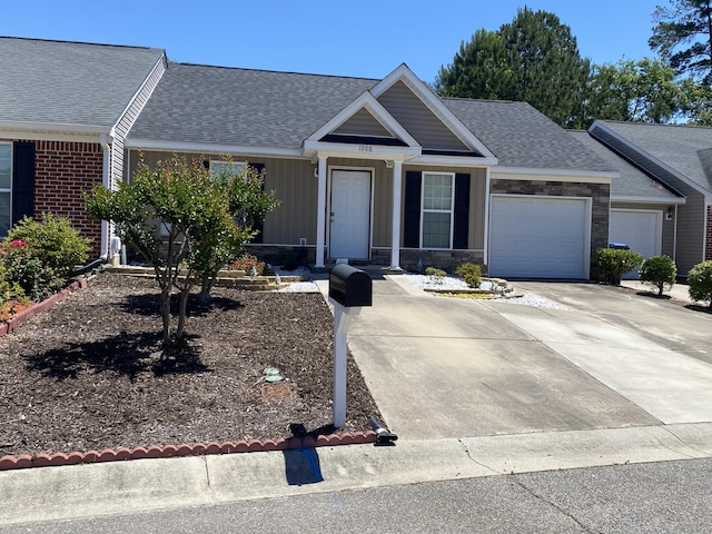 1908 Aspen Green Way, Augusta, GA 30909 - ranch-style home with an attached garage, driveway, a shingled roof, and stone siding