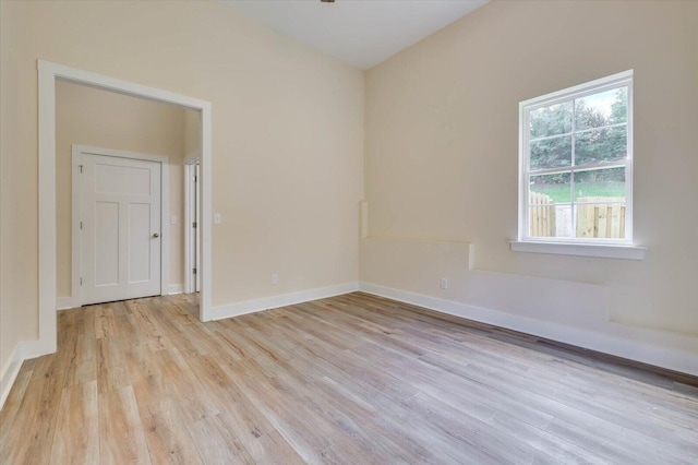 unfurnished room featuring light hardwood / wood-style floors