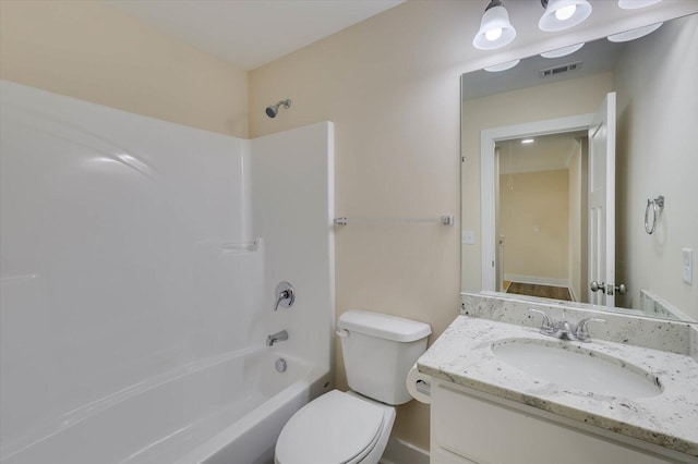 full bathroom with shower / bathing tub combination, vanity, and toilet