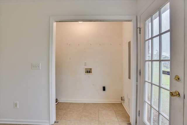 laundry area featuring washer hookup, electric dryer hookup, and light tile patterned floors