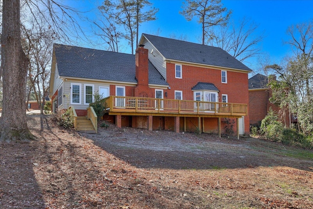 rear view of property with a deck