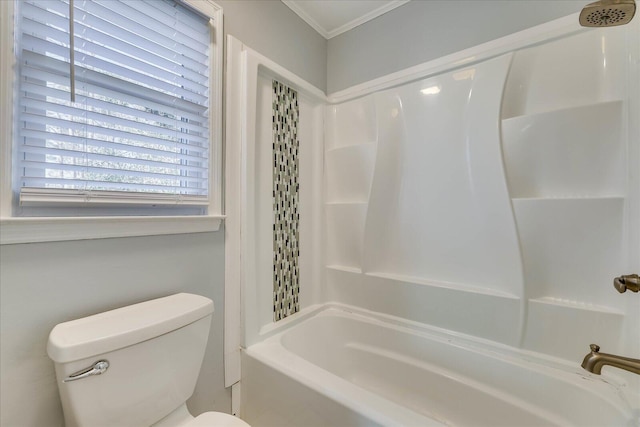 bathroom featuring shower / bathtub combination and toilet