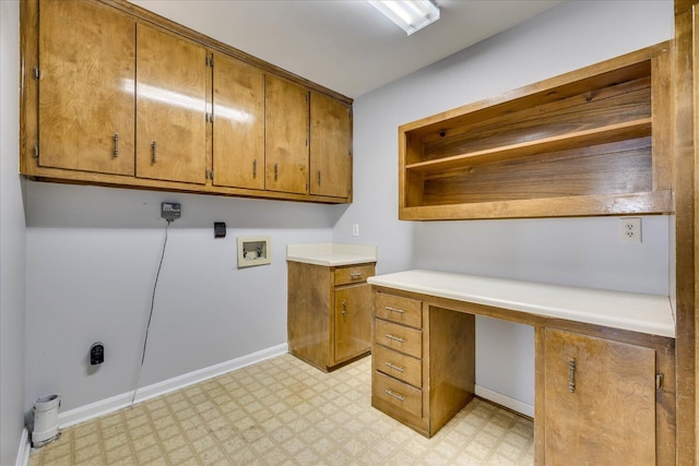 laundry area featuring cabinets and washer hookup