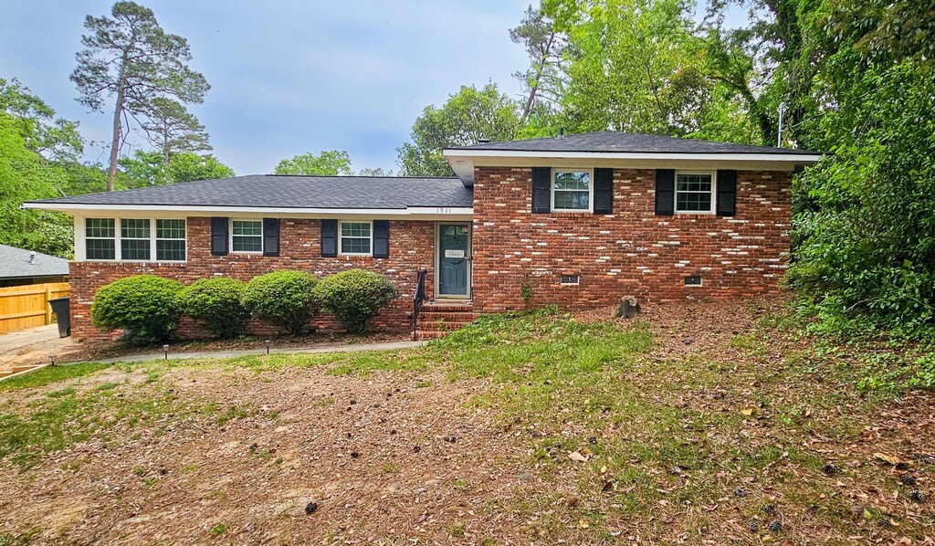 1911 Bobolink Ave, North Augusta, SC 29841 - split level home featuring brick siding and fence