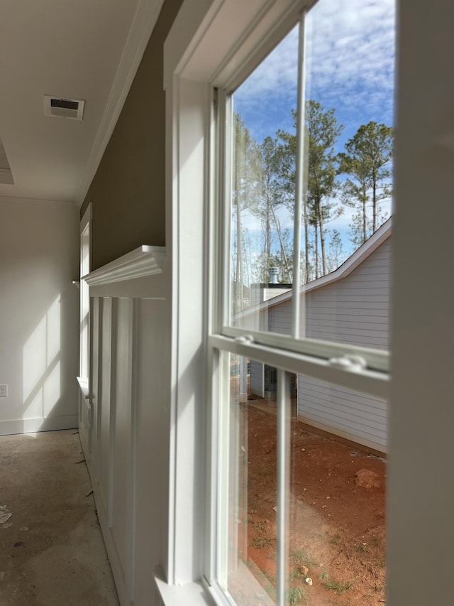 view of side of property featuring a balcony