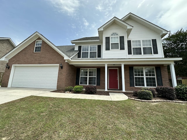 7623 Senators Ridge Dr, Grovetown, GA 30813 - view of front of home featuring brick siding, a garage, concrete driveway, and a front lawn