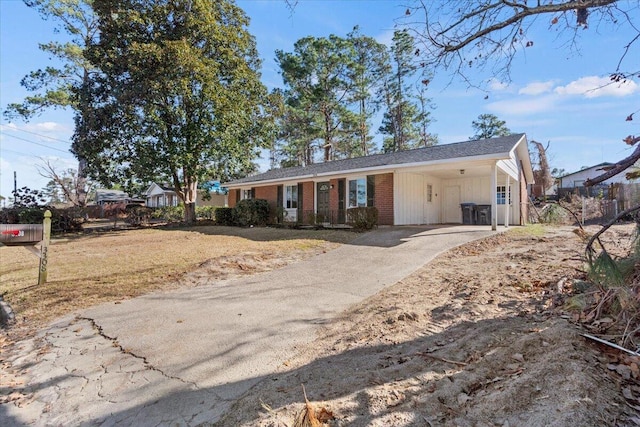 ranch-style home with a carport