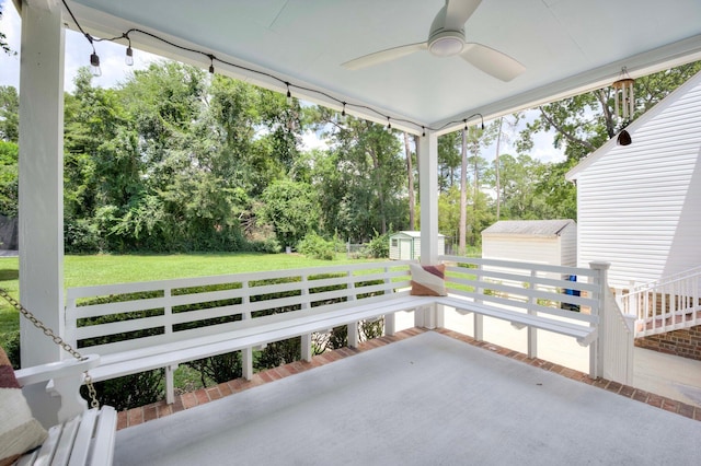 3103 Holly Haven Dr, Augusta, GA 30907 - view of patio featuring a storage unit, view of scattered trees, and a ceiling fan