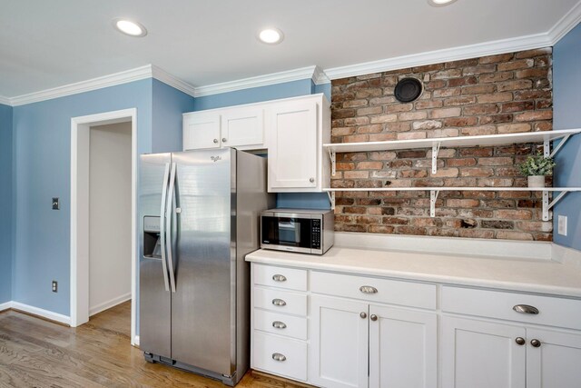 3103 Holly Haven Dr, Augusta, GA 30907 - kitchen featuring appliances with stainless steel finishes, ornamental molding, white cabinets, open shelves, and light wood-type flooring