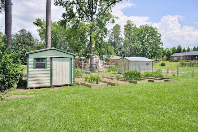3103 Holly Haven Dr, Augusta, GA 30907 - view of yard with a garden, a shed, and view of scattered trees