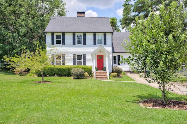 3103 Holly Haven Dr, Augusta, GA 30907 - colonial inspired home with a chimney, roof with shingles, and a front yard